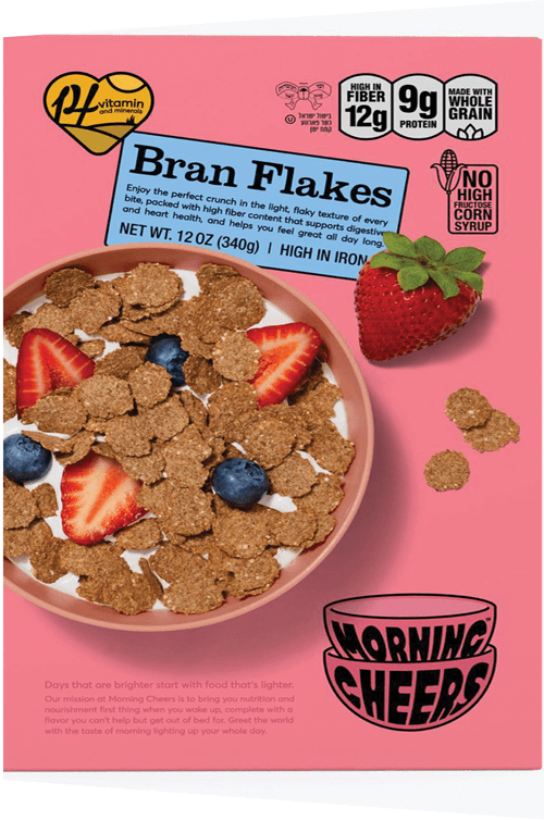 Cereal bowl with strawberries and blueberries on pink background.